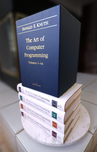 Image of The Art of Computer Programming book collection.